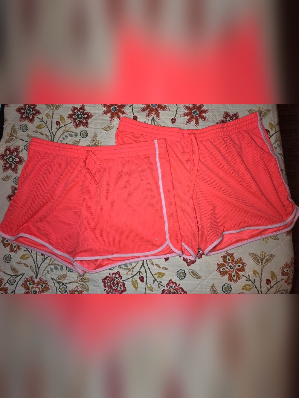 Two pair of neon coral Danskin Now mesh athletic shorts, size 2X
